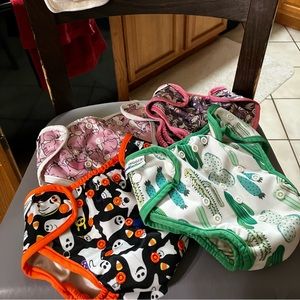 4 Cloth diapers and 10 inserts
